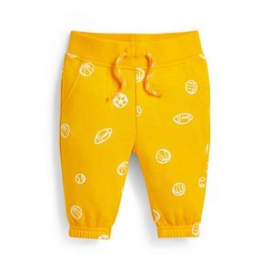 Oferta de Pantalones de chándal amarillos con estampado deportivo para bebé niño por 4€ en Primark