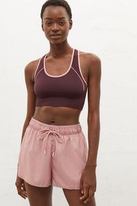 Oferta de Sujetador deportivo reversible rosa por 10,99€ en Springfield