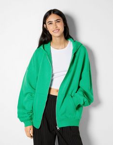 Oferta de Sudadera cremallera capucha oversize por 11,49€ en Bershka