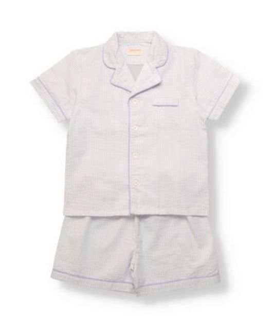 Oferta de Pijama manga corta de niño en tejido de seersucker, rayas blancas y azules, con detalle de vivos en azul y cuello pijamero. por 31,5€ en Neck&Neck