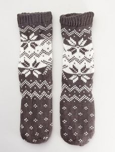 Oferta de Zapatillas de casa tipo calcetines por 4€ en Kiabi