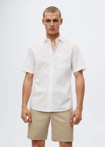 Oferta de Camisa algodón manga corta por 12,99€ en MANGO Man